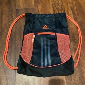 Adidas orange and black sports bag